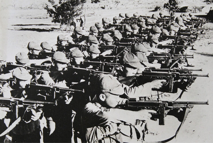 Members of the Eighth Route Army aiming their weapons