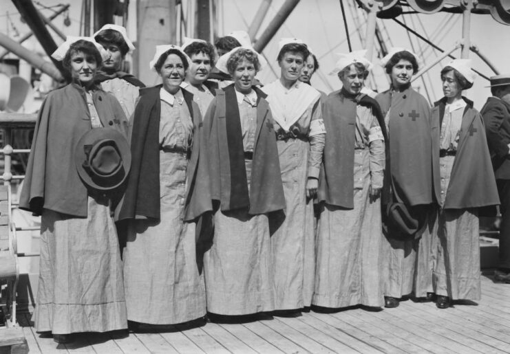 Nurses standing on the deck of the SS Red Cross