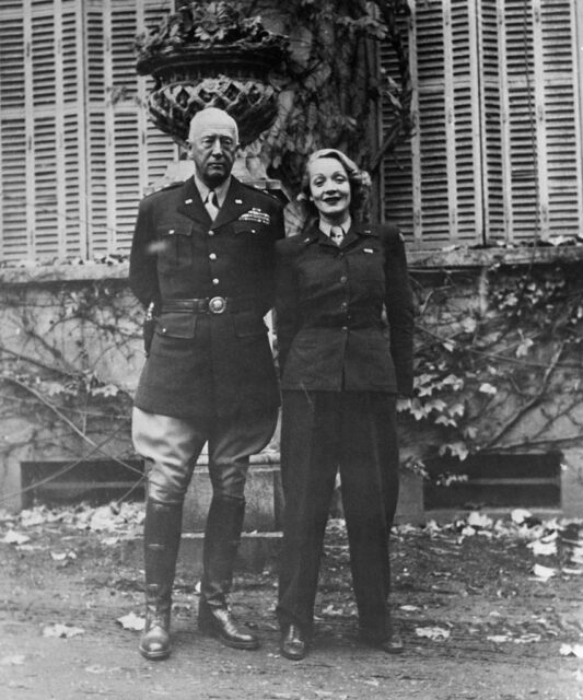 George Patton standing with Marlene Dietrich