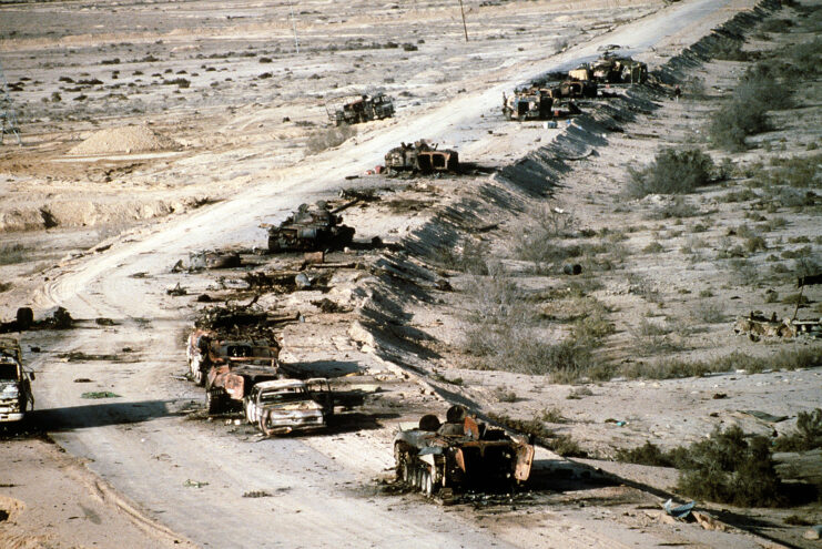 Aerial view of destroyed tanks and armored vehicles along Highway 8