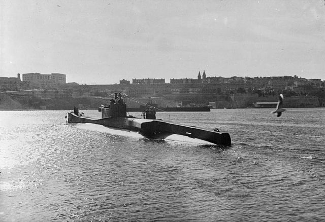 HMS Trooper (N91) surfacing while leaving port