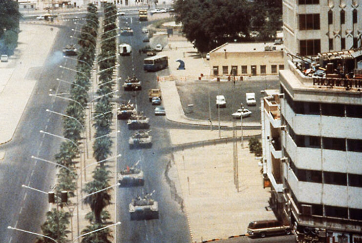 Aerial view of T-72s driving down a street in Kuwait City, Kuwait