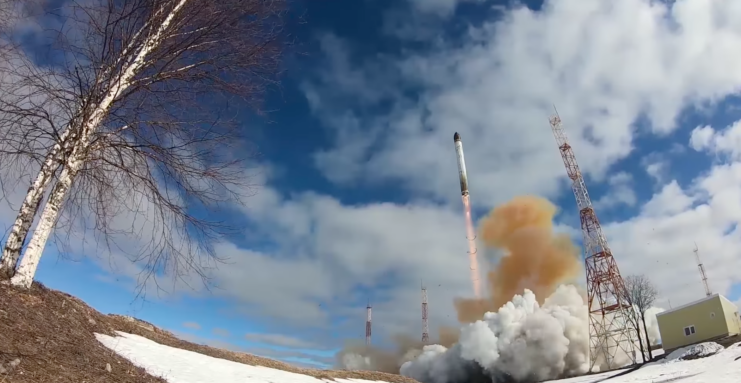 RS-28 Sarmat intercontinental ballistic missile (ICBM) being launched on a semi-cloudy day