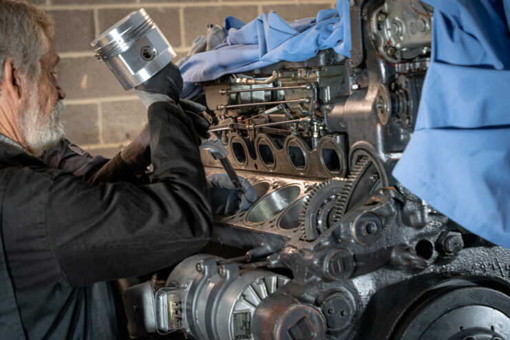 Volunteer working on a Maybach engine