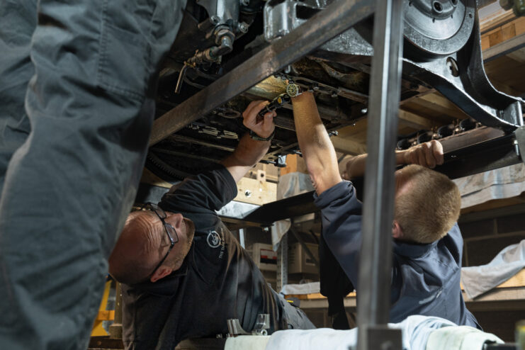 Workers from the Tank Museum and ARMYTECH re-installing Tiger 131's engine