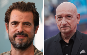 Claes Bang standing on a red carpet + Ben Kingsley standing on a red carpet