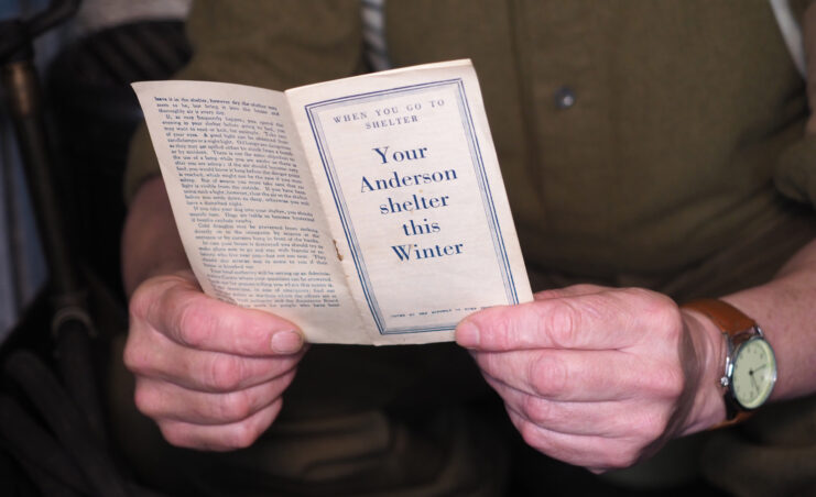 Trad Casey holding a winter guide provided with Anderson Shelters