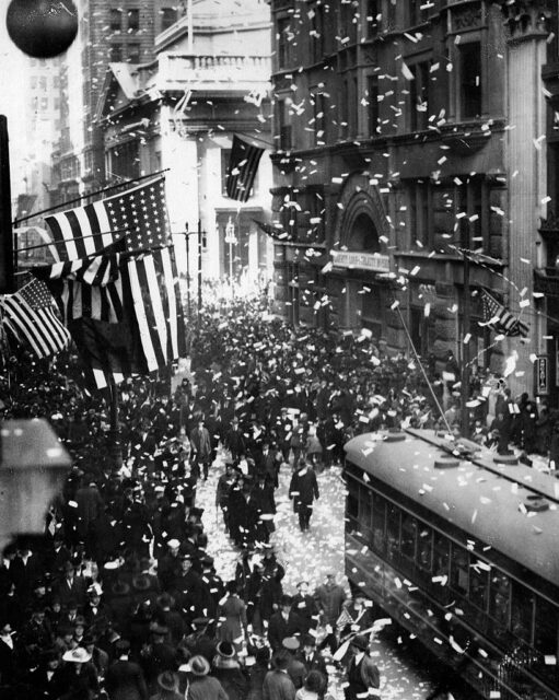 Crowd celebrating in a city street