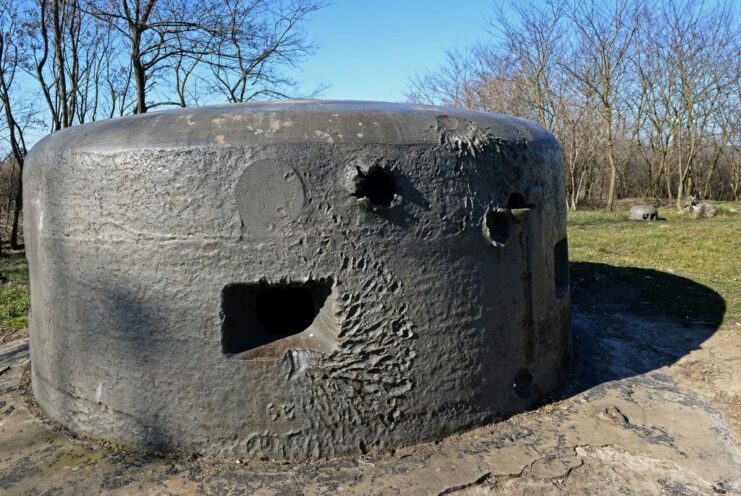 Concrete bunker with artillery damage