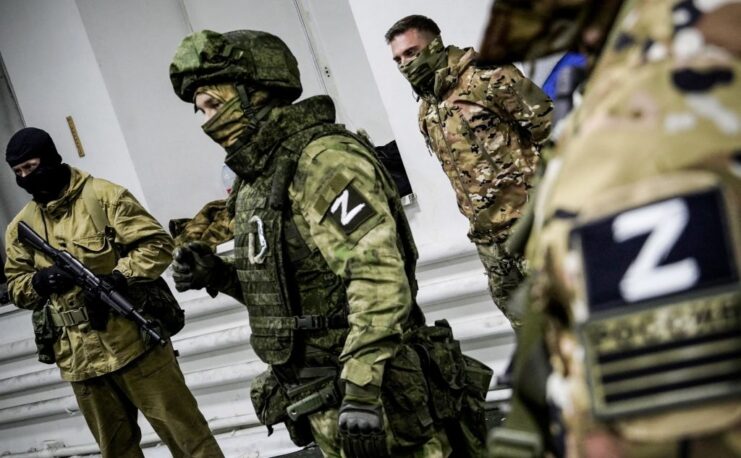 Russian volunteer soldiers standing in uniform