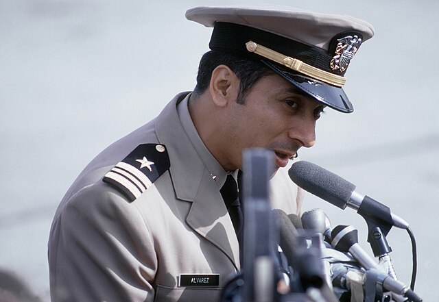 Everett Alvarez, Jr. speaking into a microphone