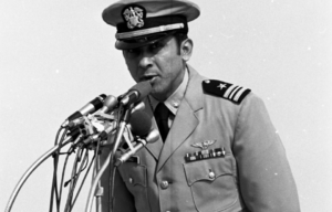 Everett Alvarez, Jr. speaking into a microphone