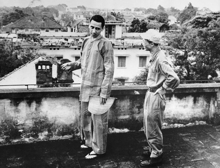 Everett Alvarez, Jr. standing with a North Vietnamese Army (NVA) officer