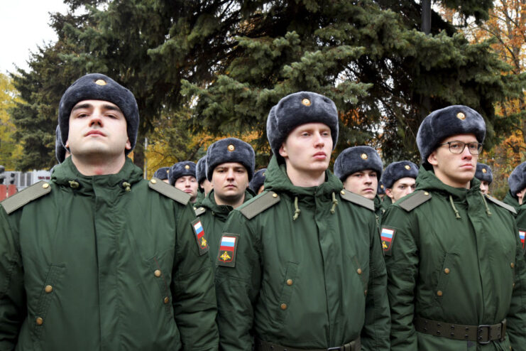 Russian soldiers standing together in their military uniforms