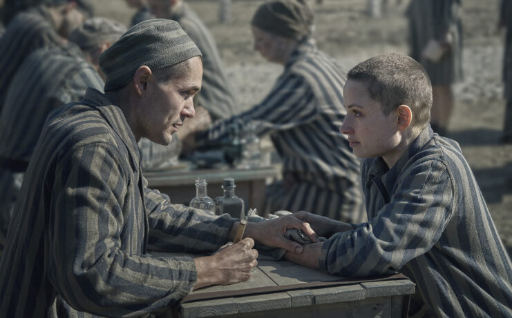 Jonah Hauer-King and Anna Próchniak as Lali Sokolov and Gita Furmanova in 'The Tattooist of Auschwitz'