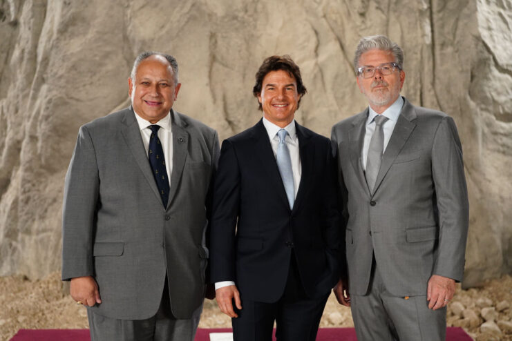 Carlos Del Toro, Tom Cruise and Christopher McQuarrie standing together