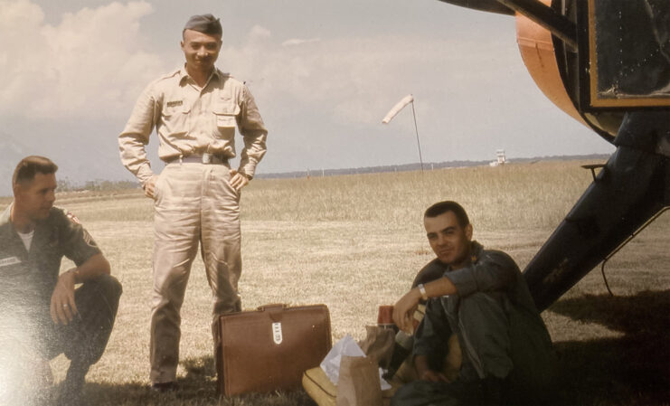 Hugh R. Nelson, Jr. with two other service members