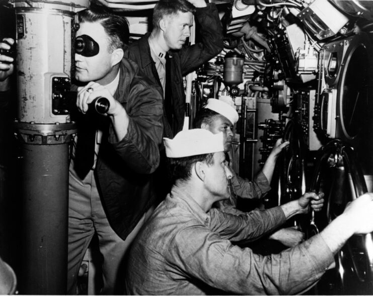 Jimmy Carter with three other sailors aboard the USS K-1 (SSK-1)